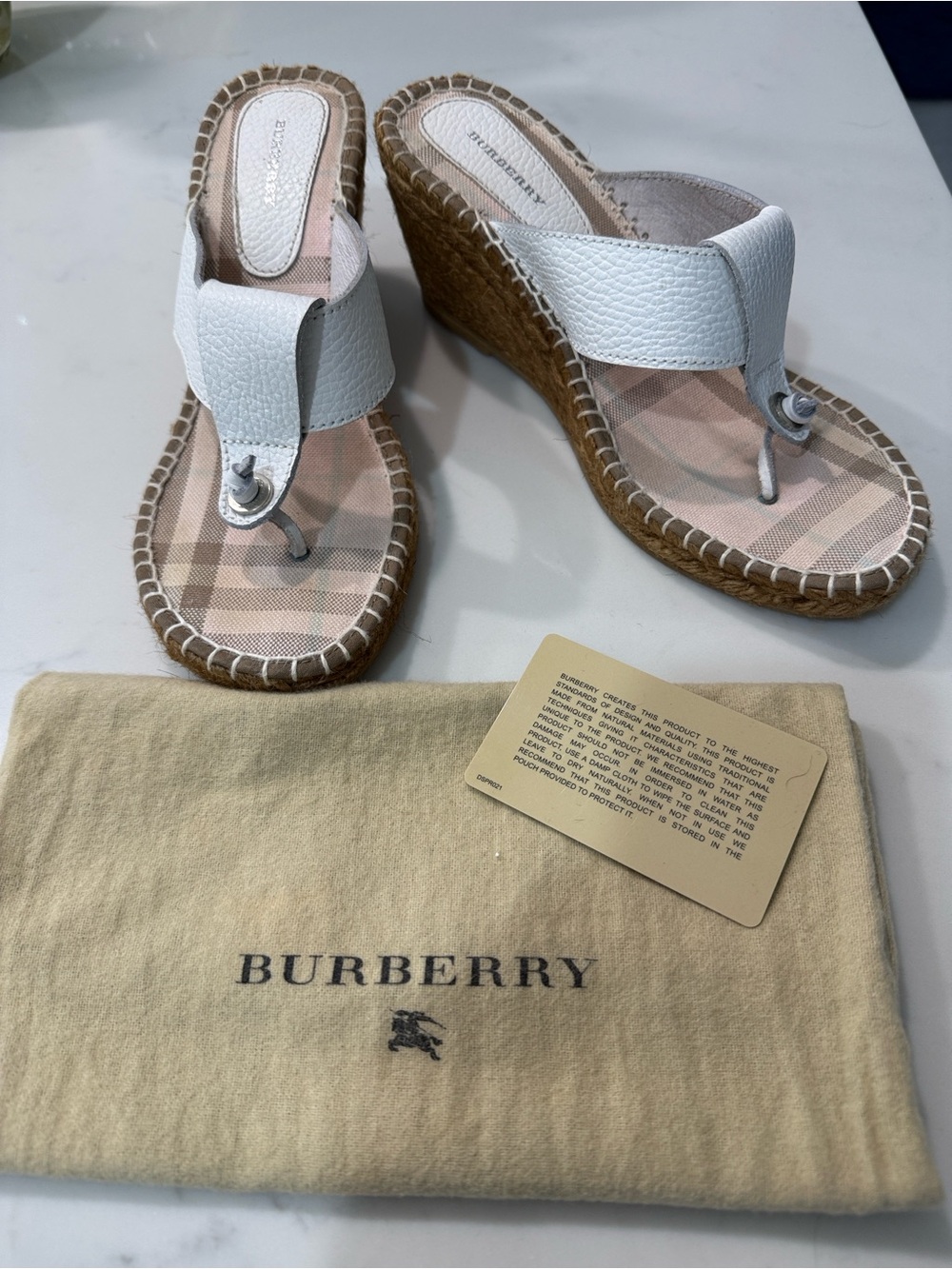 Burberry White Leather Wedge Thong Sandals with dust bag and care card.